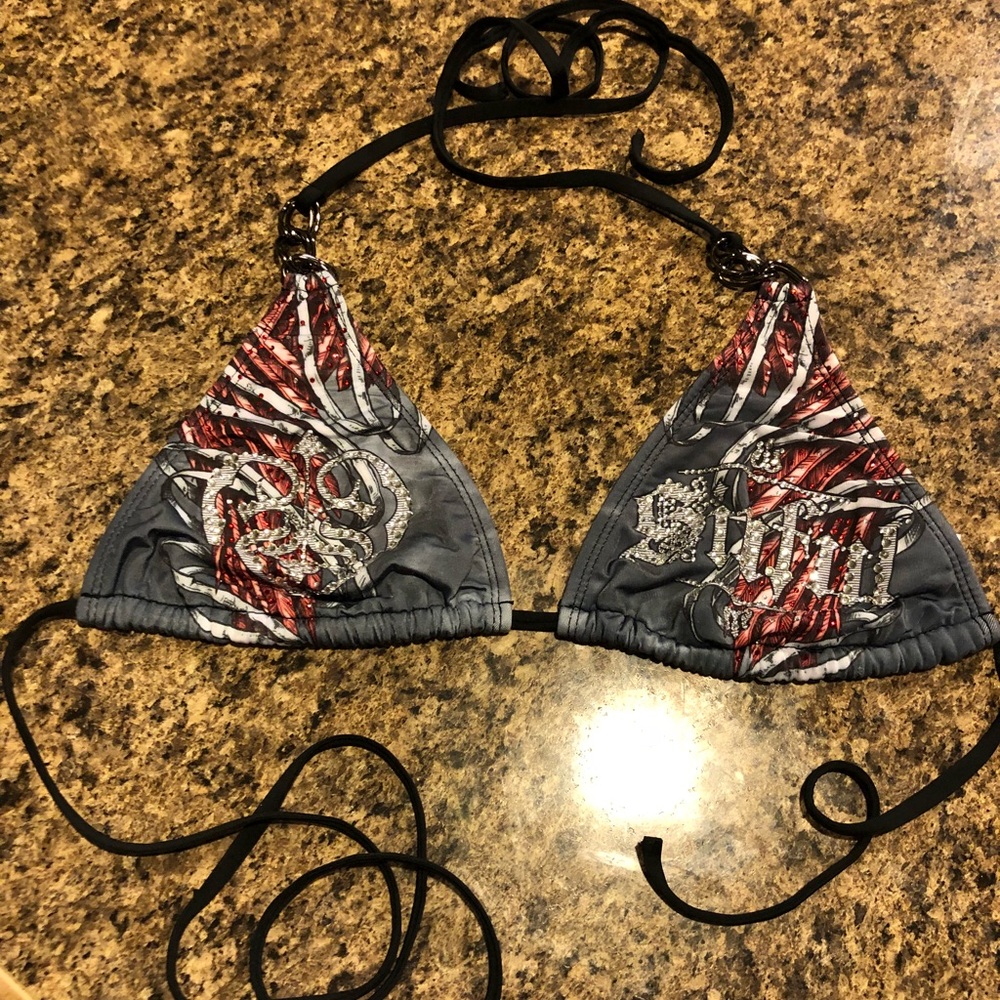 Sinful swim top. From the buckle.